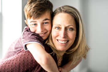 A people and family happy boy with mother at home