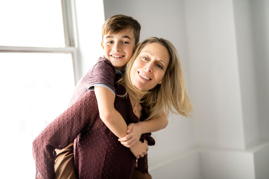 A People And Family Happy Boy With Mother At Home