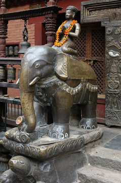 Statue with a turtle, an elephant and a man in Nepal Kathmandu