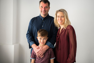 Fototapeta premium A couple with the child boy at home