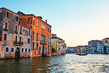 Colorful buildings on water in Venice city