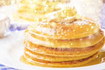 Stack of delicious pancakes with butter