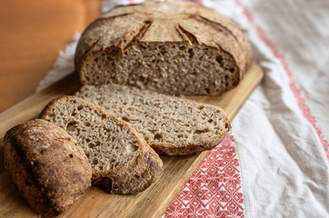 rustic fresh loaf of active yeast bread sliced 