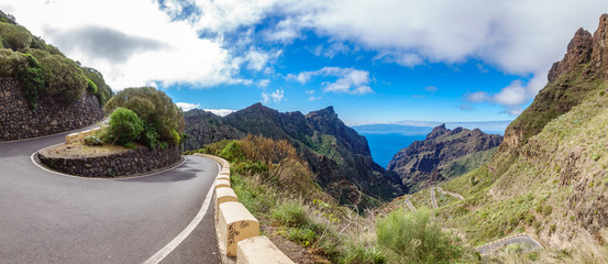 Iconic road in Teno mountains with curved mountain road - obrazy, fototapety, plakaty