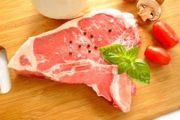 Raw Pork Chop with Fresh Ingredients