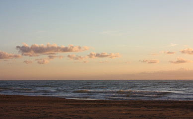 Fototapeta premium romantic and dreamy panorama of the sea of ​​versilia in tuscany. a peaceful day despite the cold of winter. rest and relaxation