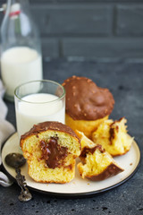 Brioche bun with chocolate filling and chocolate coating.