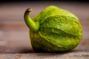 Tomatillo on Wooden Background