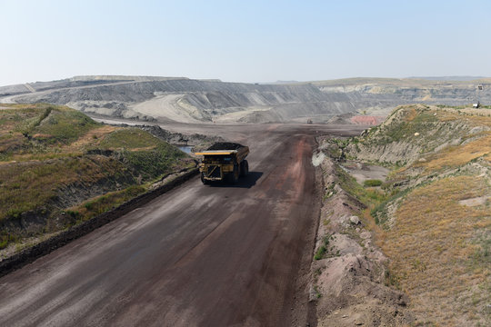 Giant mining truck hauling coal, open pit Eagle Butte mine, Wyoming