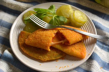 Fried panzerotti filled with tomato sauce and cheese -  Italian Food