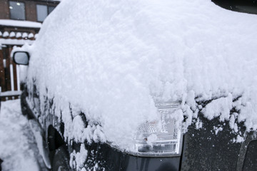 Krasnodar, Russia-December 26, 2018. Snow on cars after snowfall. Extreme snowfall in european city