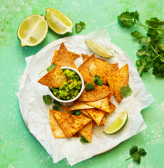 corn tortilla chips with guacamole dip.