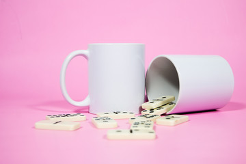 Coffee mugs with background pink vitage anda dominoes