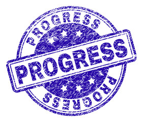 PROGRESS stamp seal watermark with grunge texture. Designed with rounded rectangles and circles. Blue vector rubber print of PROGRESS text with grunge texture.