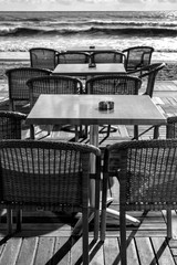 tables and chairs at sea