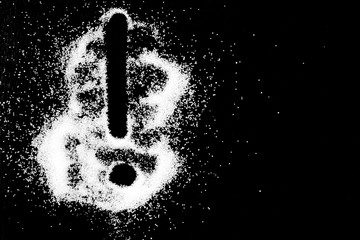 Exclamation mark sign symbol drawing by finger on white snow salt powder spot cloud on the left...