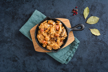 Bigos-traditional Polish dish of finely chopped sauerkraut and fresh cabbage with meat, mushrooms, and sausage. The dish is also traditional for Belarusian, Ukrainian and Lithuanian cuisine.