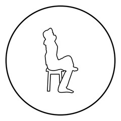 Man sitting pose with hands behinds head Young man sits on a chair with his leg thrown silhouette icon black color illustration in circle round
