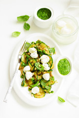 Grilled zucchini, mozzarella and pesto salad. Selective focus.