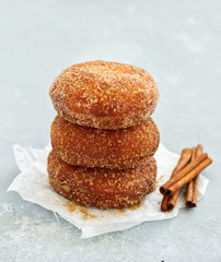 Donuts with cinnamon and chocolate cream. Homemade baking. Selective focus.