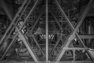 Black and white photo of beams and bell in the cathedral
