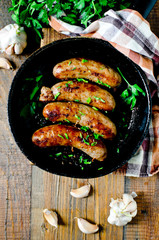 Homemade sausages from turkey (chicken) fried in a frying pan