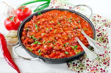 Stewed beans with tomatoes and vegetables