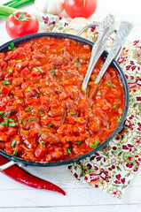 Stewed beans with tomatoes and vegetables