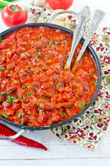 Stewed beans with tomatoes and vegetables