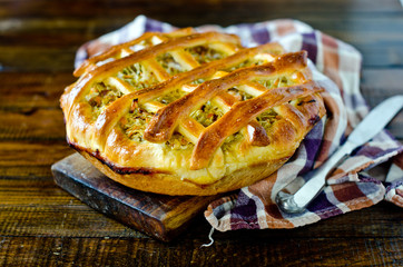 Pie with cabbage and vegetables
