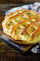 Pie with cabbage and vegetables