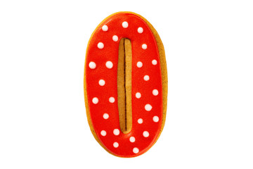 Gingerbread red letter O cookie isolated at white background.