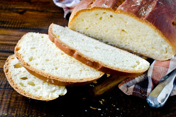 Homemade bread on a dark wooden background