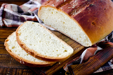 Homemade bread on a dark wooden background