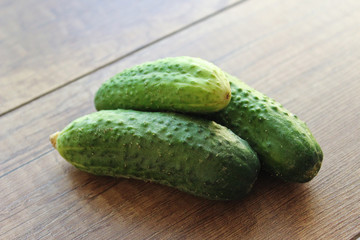Cucumber on wooden background, vegetables
