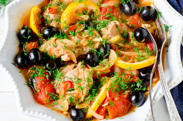 Chicken (turkey) stewed with tomatoes, olives and lemon in Italian style