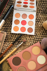 fashion set of new cosmetics palettes with  brushes. close up