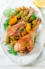 Baked turkey legs with Brussels sprouts and lemon