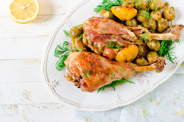 Baked turkey legs with Brussels sprouts and lemon