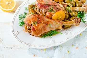 Baked turkey legs with Brussels sprouts and lemon