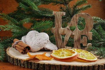 White gingerbread in the shape of a heart, the inscription 