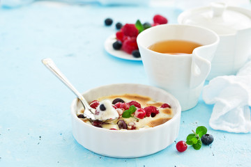 Zabaglione with champagne and berries. French dessert.