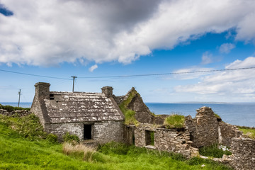 Fototapeta na wymiar Abandoned houses located in Burren region in County Clare, Ireland