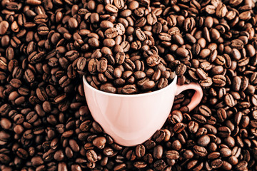 Roasted coffee beans background. Flat lay, top view