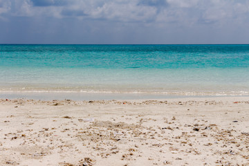 Powder beautiful soft white sandy beach and crystal clear turquoise water, Maldives