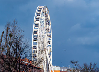 Gdansk, Poland , Ferris wheel  on a background of blue sky.