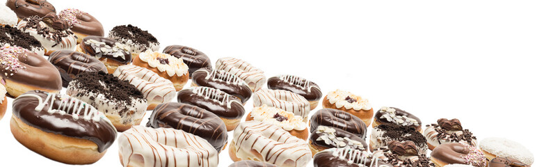 Multiple doughnuts on white background. High resolution image for food industry.