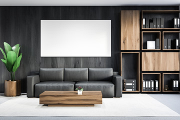 Gray wooden office lounge, sofa and poster