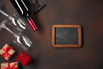 Valentine's Day with hearts, wine, glasses, gifts, a box in the form of a heart and a corkscrew