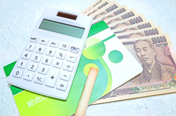 お金（一万円札）と通帳